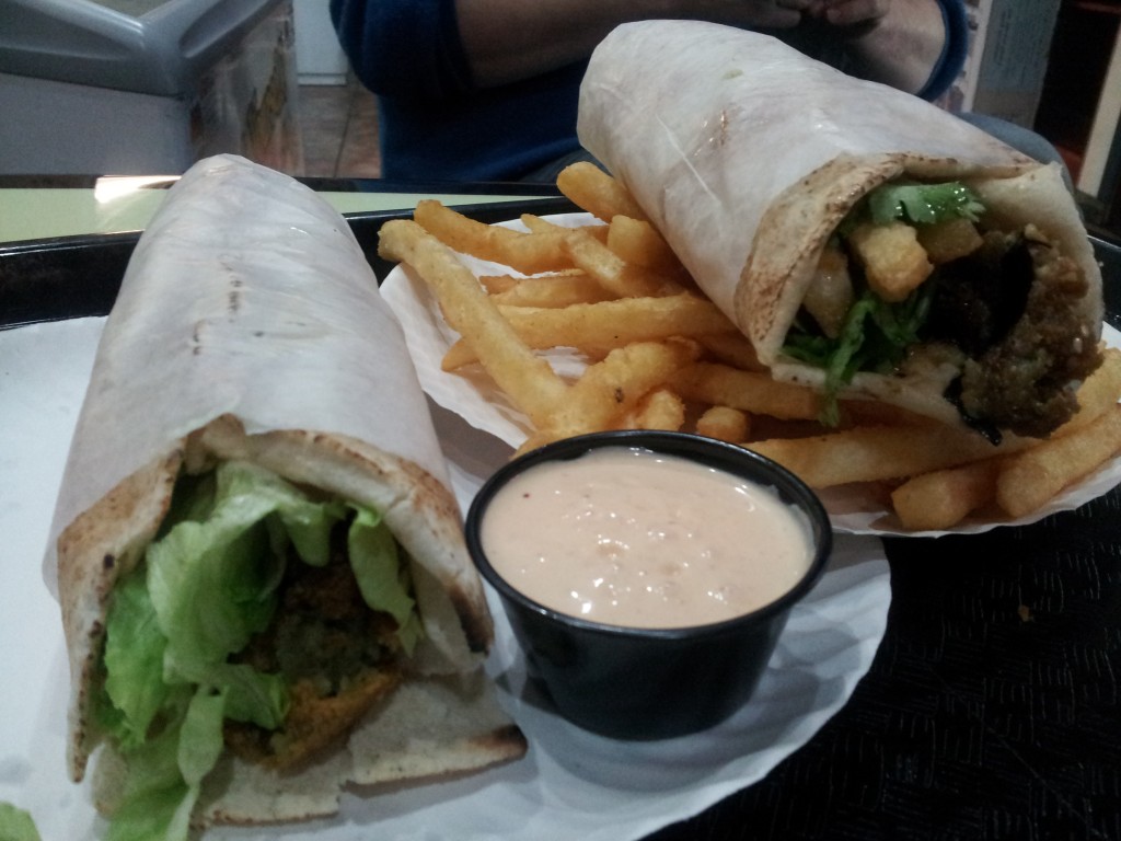 Falafel sandwich, dynamite sandwich, and french fries w/ mango dipping sauce