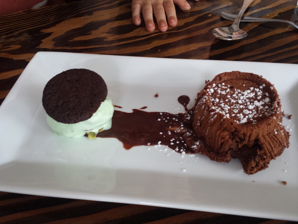 Chocolate souffle with pistachio ice cream